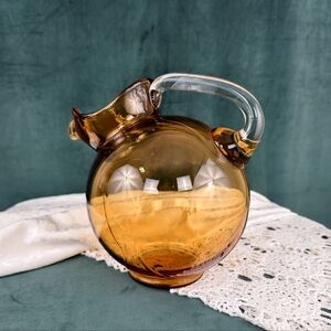 Vintage Amber Spherical Glass Pitcher with Clear Handle